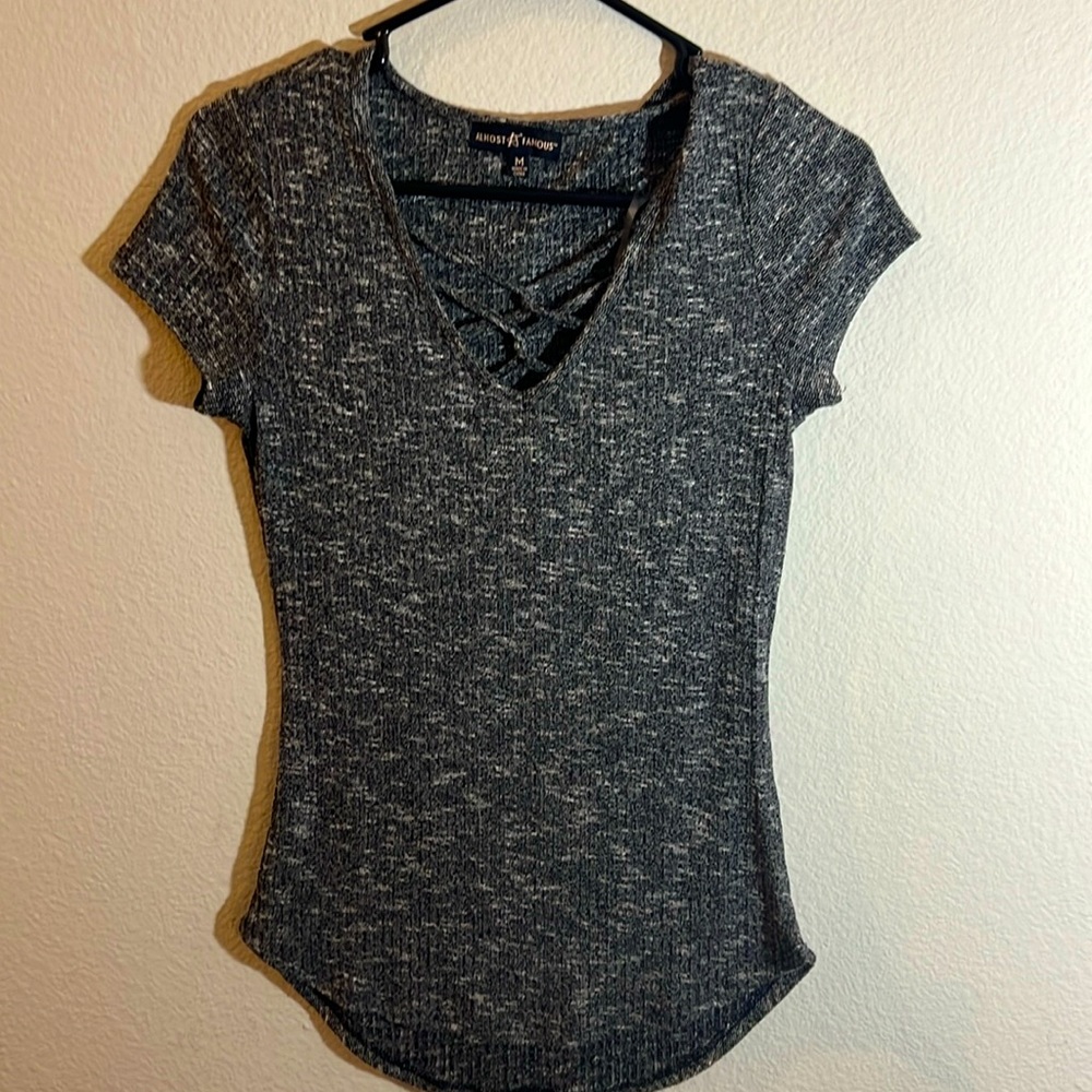 Almost Famous brand top